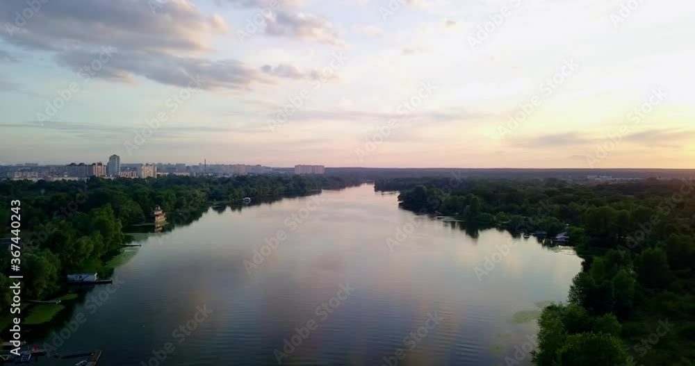Drone take off during a beautiful sunset overlooking the forest and the river Ukraine. Beautiful sky Drone take off during a beautiful sunset overlooking the forest and the river Ukraine. Beautiful sky