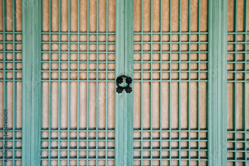 Photography Korean traditional green wooden door at Jongmyo Shrine in Seoul, Korea