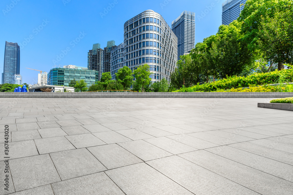 Empty square floor and modern commercial buildings in Shanghai,China.