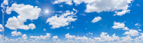 Panorama blue sky and clouds with sun and daylight natural background.