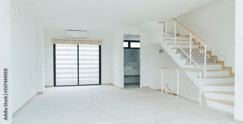 white space room interior with stair to upper level floor home interior design concept