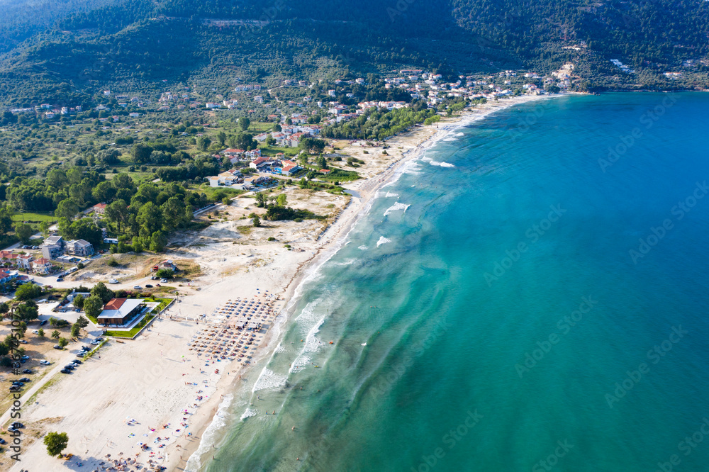  Aerial view of idyllic Golden beach toward the headland at Skala Potamia, Thassos, Greece