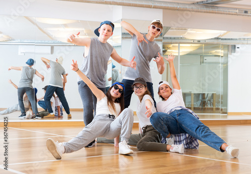 Portrait of group of teenagers in dance studio. Hip hop dancers