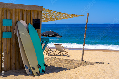 Surfboards on the beach. Paradise nature. Sea view. Beautiful abstract with blue sea beach day on light background for lifestyle design.