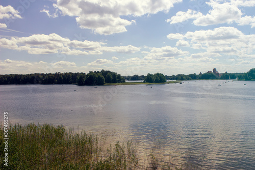 Beautiful landscape. Lake Galve in Lithuania. Green trees in a front