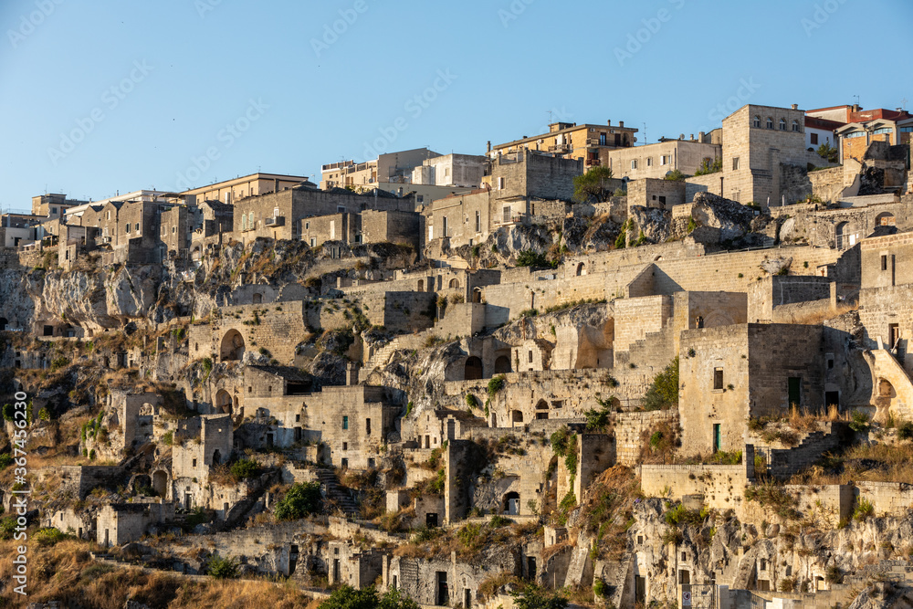 View of the Sassi di Matera a historic district in the city of Matera, well-known for their ancient cave dwellings. Basilicata. Italy