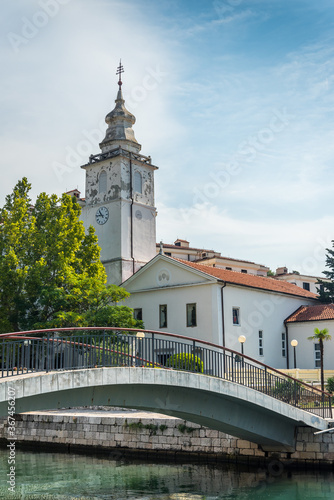 The bridge Ponte Della Madonnina over river with the church in the background in Crikvenica. Crikvenica is a popular holiday resort in Kvarner riviera in Croatia