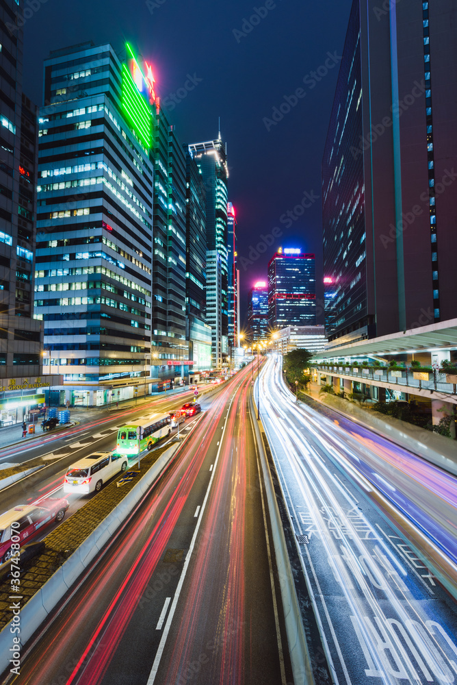Light trails and skyscrapers at night in Hong Kong Light trails and skyscrapers at night in Hong Kong