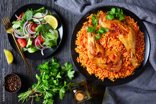 Bilde på lerret Thakkali sadam with chicken and salad, flat lay
