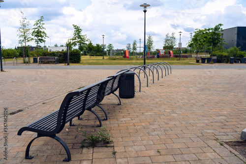 Empty bicycle parking park with bench on old coal mine area called Schlaegel Eisen in HERTEN, Germany