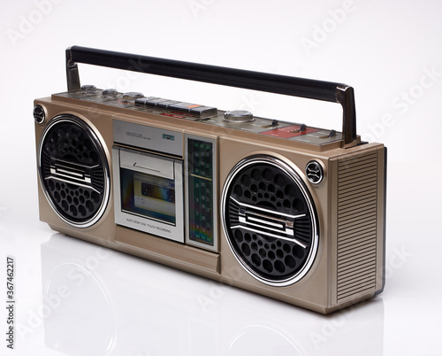 Vintage boom box on white background with reflection