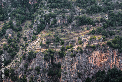 Rocks and orchard terraces in Kadisha Valley also spelled as Qadisha in Lebanon