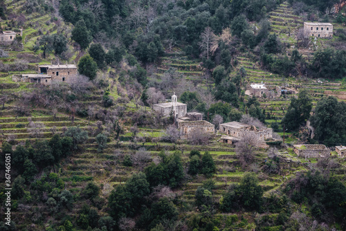 Small church and old cottages in Kadisha Valley also spelled as Qadisha in Lebanon photo