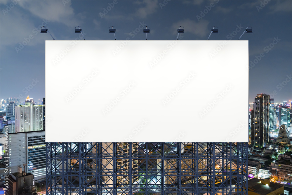 Blank white road billboard with Bangkok cityscape background at night time. Street advertising poster, mock up, 3D rendering. Front view. The concept of marketing communication to promote idea. Blank white road billboard with Bangkok cityscape background at night time. Street advertising poster, mock up, 3D rendering. Front view. The concept of marketing communication to promote idea.