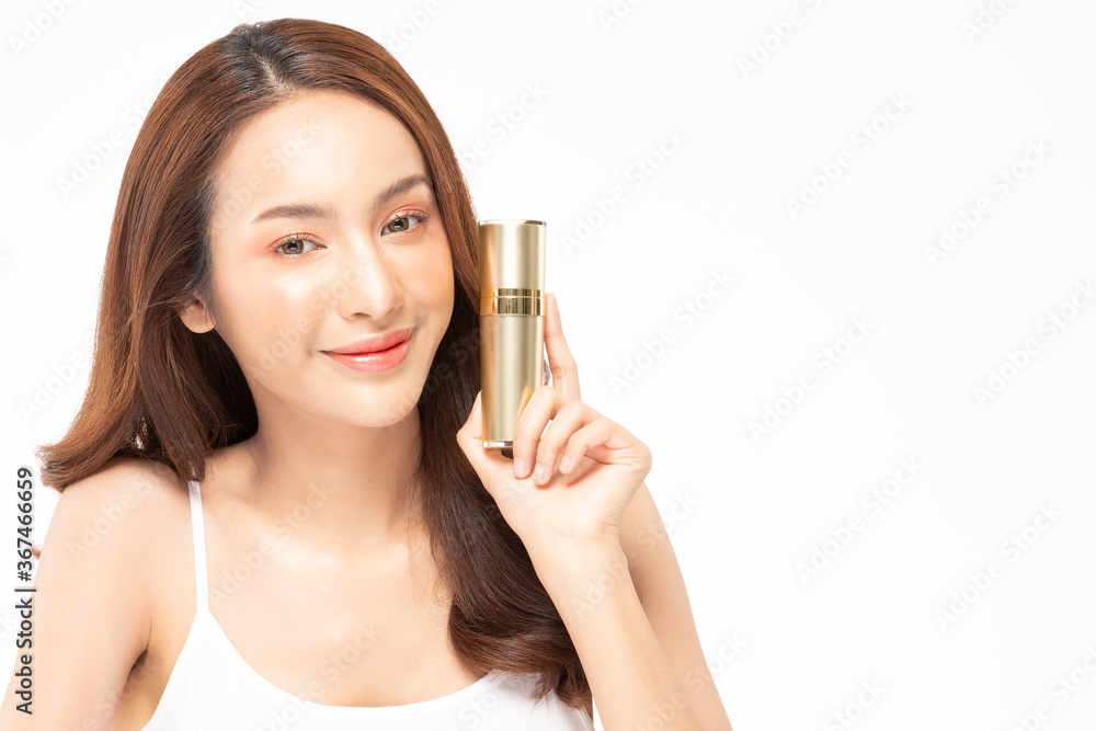Beauty asian woman hold bottle cosmetic cream lotion and cheerful. Beauty asian woman hold bottle cosmetic cream lotion and cheerful.