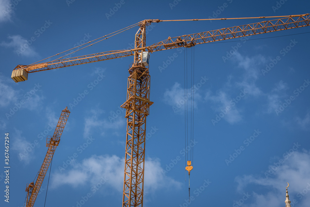 Building cranes against blue sky in Beirut Central District of Beirut, capital city of Lebanon