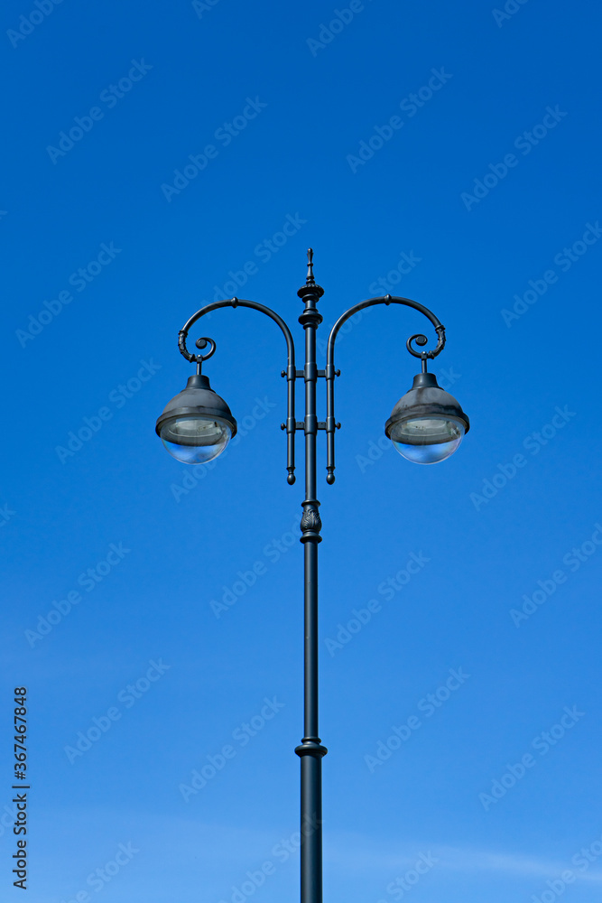 Street lamp by day