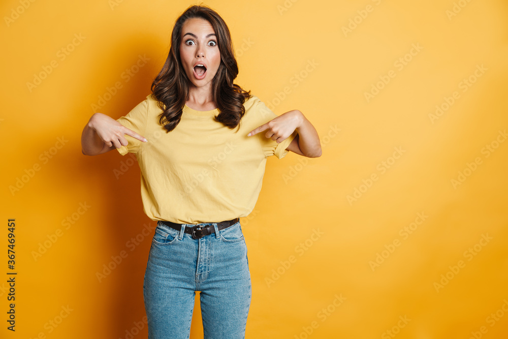 Image of shocked charming woman pointing fingers at herself Image of shocked charming woman pointing fingers at herself