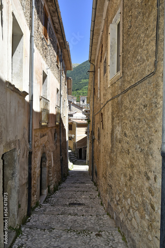A narrow street in the old buildings of San Donato Val di Comino  a medieval village in the Lazio region.