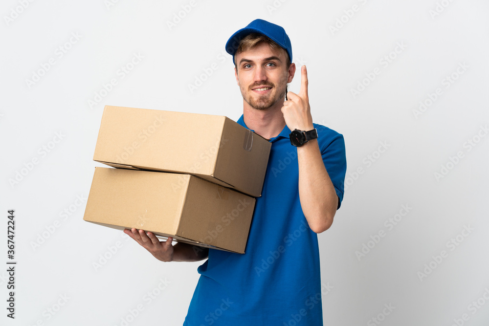 Young delivery blonde man isolated on white background doing coming gesture Young delivery blonde man isolated on white background doing coming gesture