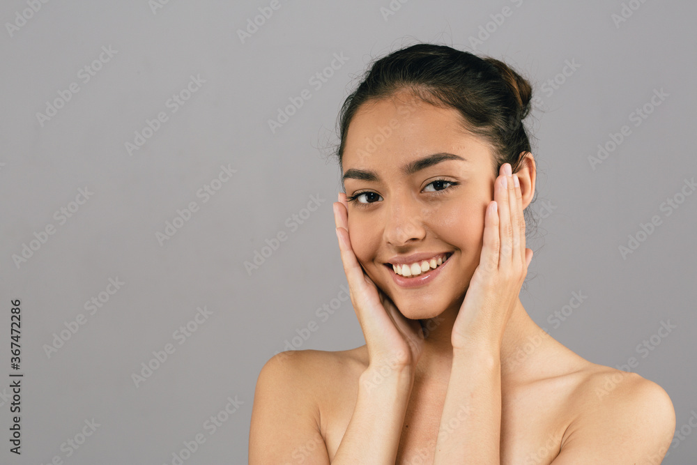 Woman beauty hands face smile skin care