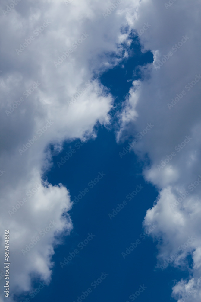 Fototapeta premium White clouds on blue sky,background,concept.