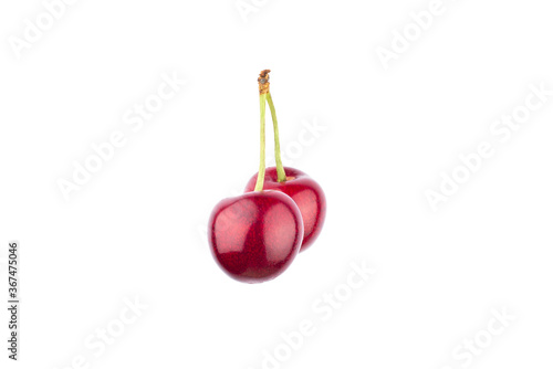 Ripe red sweet cherry isolated on white background.