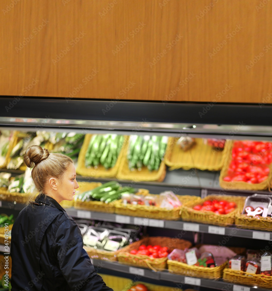 Supermarket shopping,  gloves,woman buying vegetables at the market	