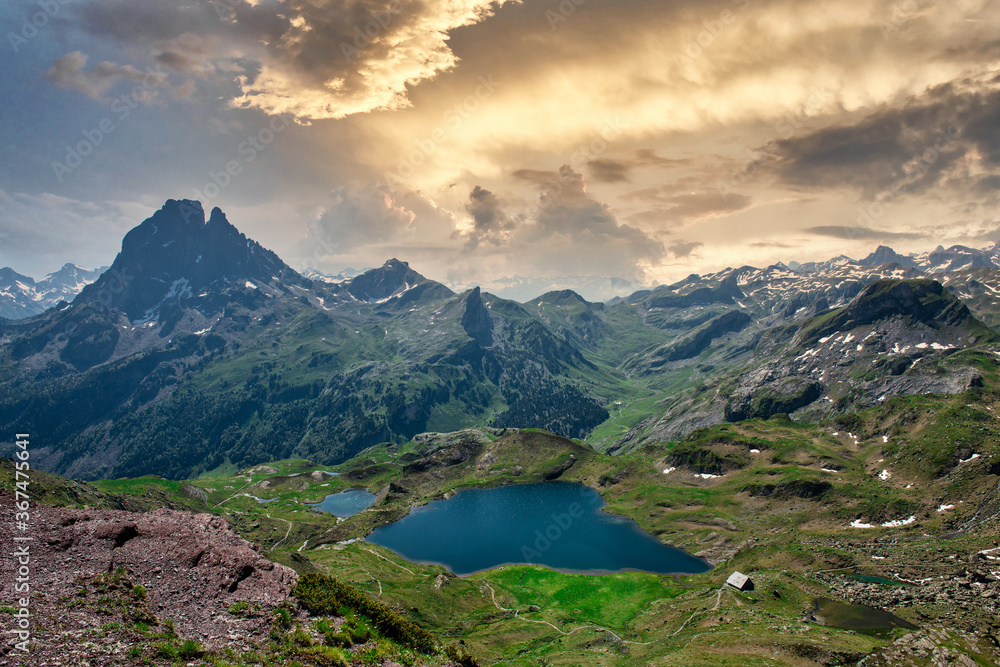 Pic du Midi Ossau and Ayous lake in french Pyrenees mountains