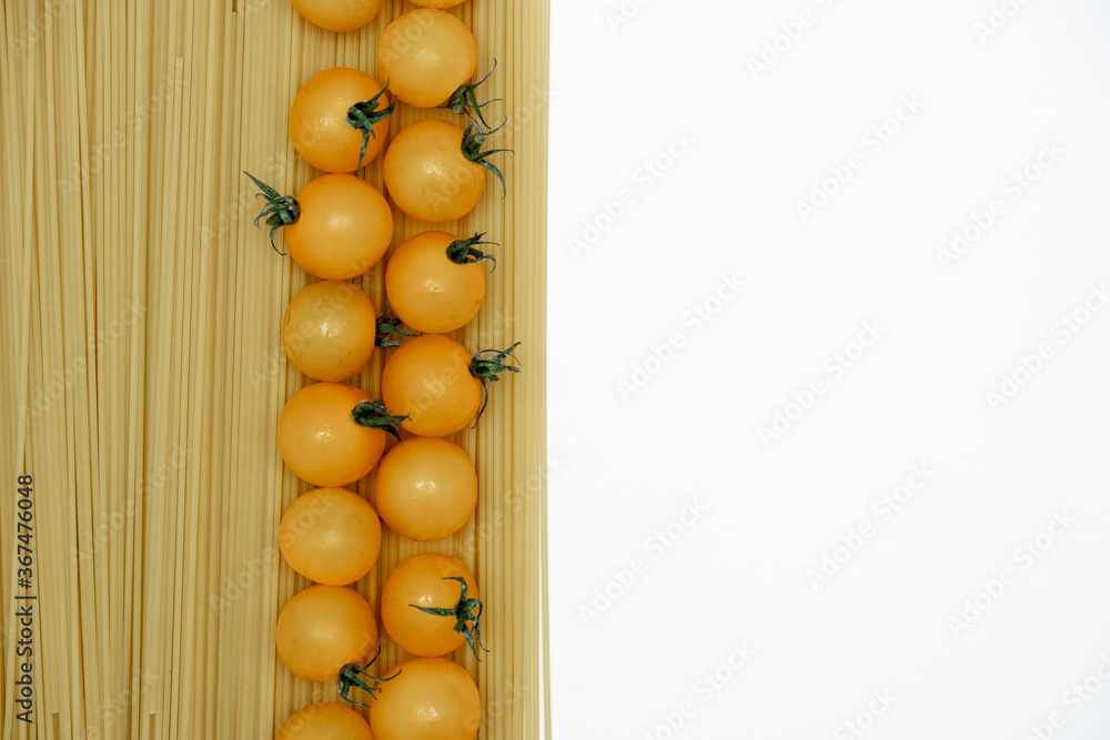 On a white background pasta and tomatoes. Food Delivery, Donation, Coronavirus Quarantine. Copy space. On a white background pasta and tomatoes. Food Delivery, Donation, Coronavirus Quarantine. Copy space.