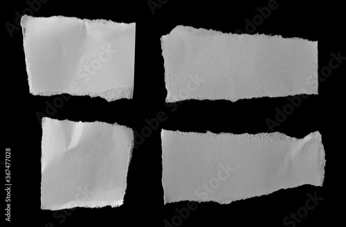 White paper scraps set and collection isolated on black background and texture, top view