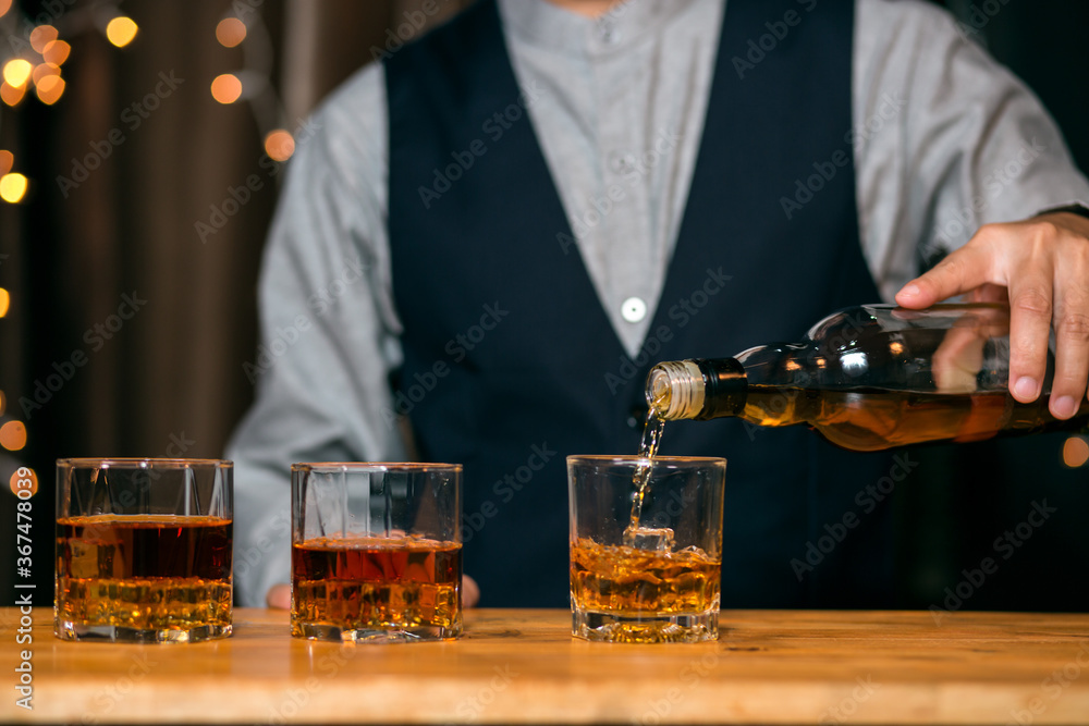 Barman pouring whiskey whiskey glass beautiful night Barman pouring whiskey whiskey glass beautiful night