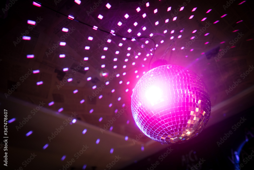 Shiny disco ball in a night club Shiny disco ball in a night club