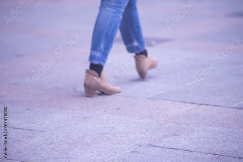 People walking sidewalk pavement