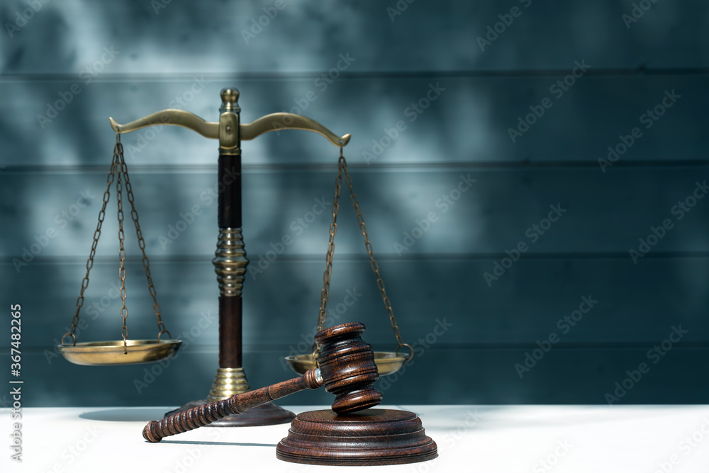 Law and Justice, Legality concept, Justice scale on a wooden background,