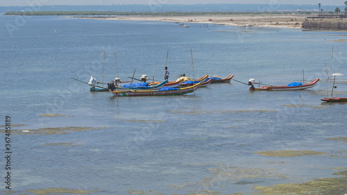 Fishermen's moorings on a backwater of the Bay of Bengal off the Tamil Nadu coast, India. The main catch in the inshore fishery is prawns