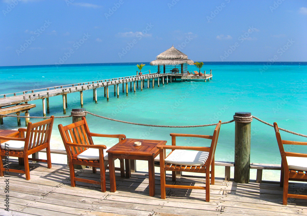 Maledives, tropical Island for a nice holiday or honeymoon. Beautiful white sandy beach with blue lagoon. Kuramathi island resort. ari atol. 