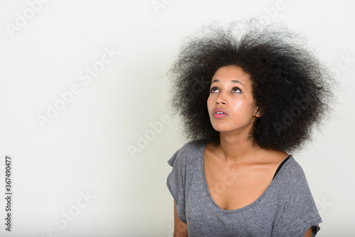Portrait of young beautiful African woman with Afro hair © Ranta Images