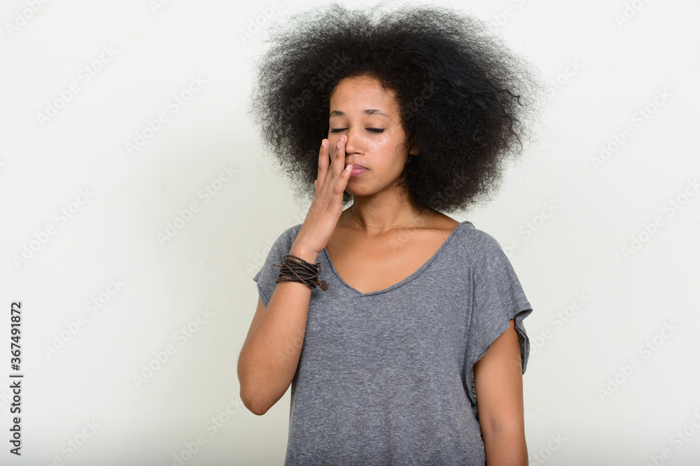 Portrait of young beautiful African woman with Afro hair Portrait of young beautiful African woman with Afro hair