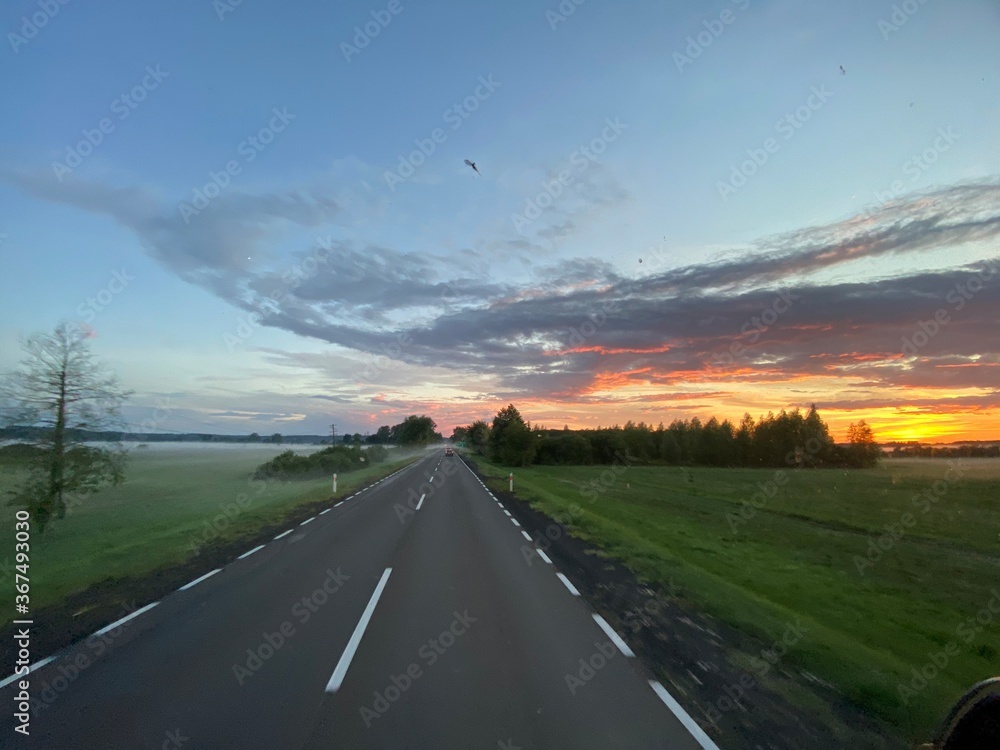 Road in Poland. Sunset. Goldenhour. Beautiful sky.  Landscape in Poland. Lubusz district