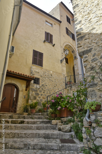 Fototapeta Naklejka Na Ścianę i Meble -  A narrow street in Fontana Liri, an old mountain town in the province of Frosinone, Italy.