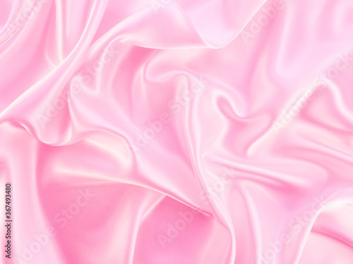 Beautiful elegant wavy light pink satin silk luxury cloth fabric texture  abstract background design. Copy space