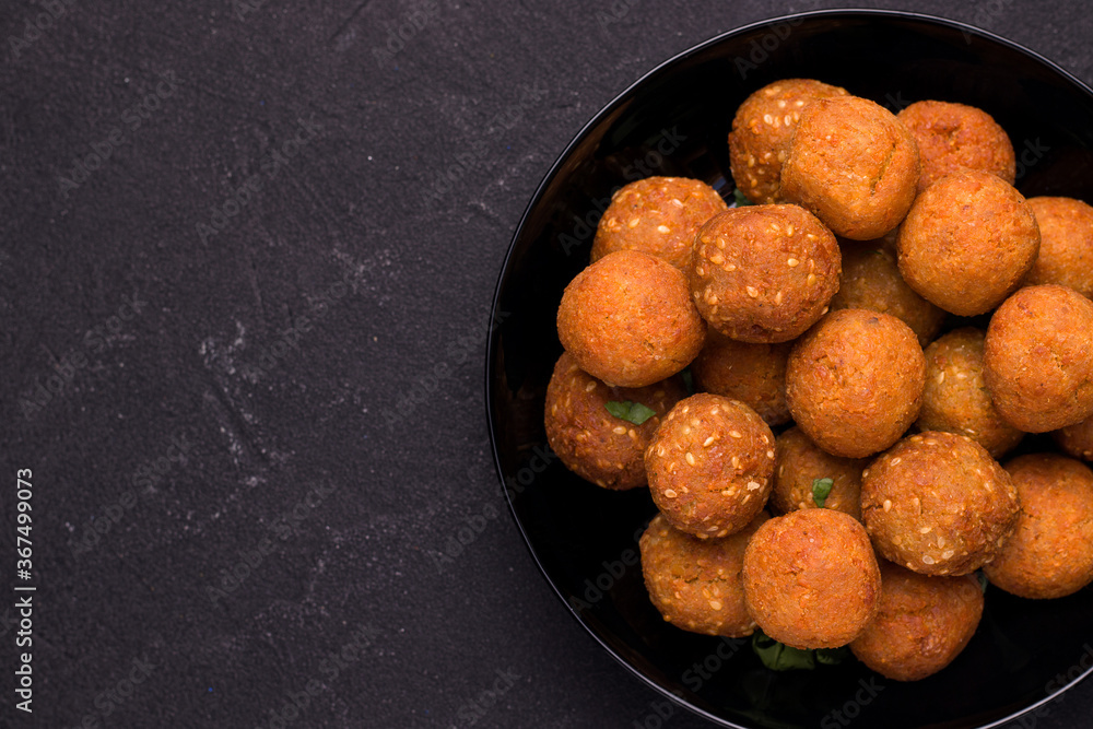 Falafel is a Middle Eastern vegan dish. Falafel is a Middle Eastern vegan dish.