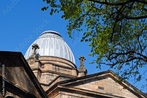 View of Lead Dome on Old Stone Classical Victorian Public Building seen against Blue Sky 