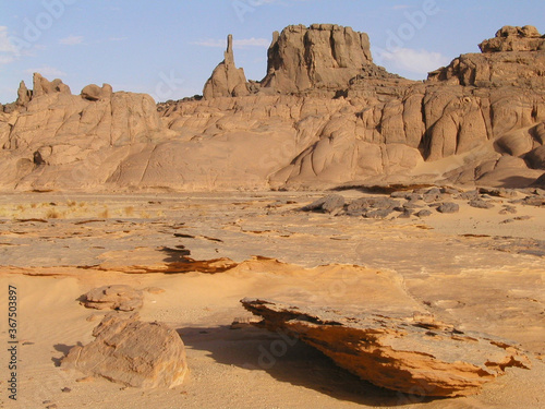 TAMANRASSET, HOGGAR MOUNTAINS. THE SAHARA DESERT IN SOUTHERN ALGERIA. SAND DUNES AND ROCK FORMATIONS.