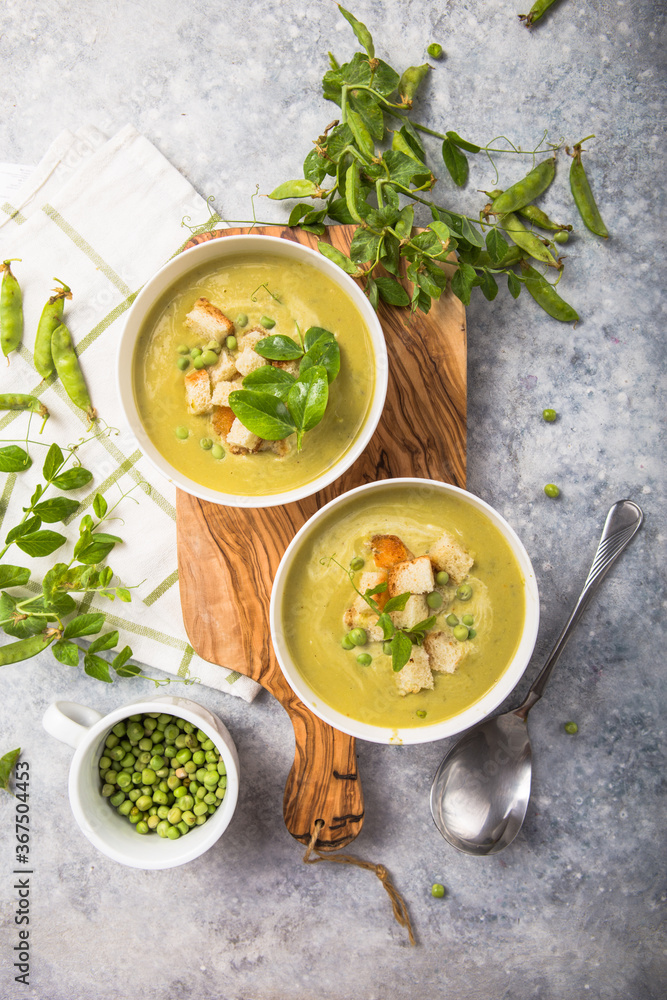 Plate of summer delicious pea soup with green peas. Top view Plate of summer delicious pea soup with green peas. Top view