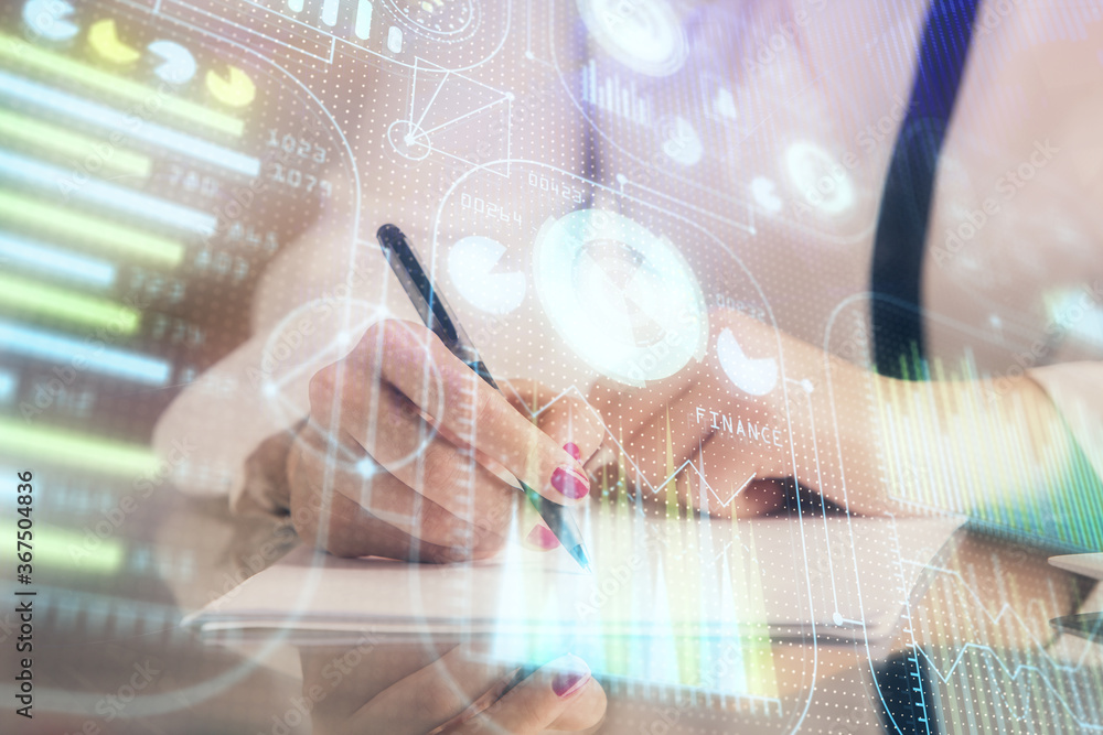 Multi exposure of woman's writing hand on background with data technology hud. Big data concept. Multi exposure of woman's writing hand on background with data technology hud. Big data concept.