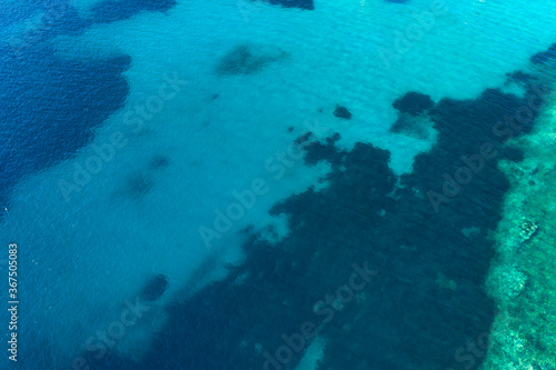 Fototapeta Naklejka Na Ścianę i Meble -  Abstract background of turquoise water-aerial view
