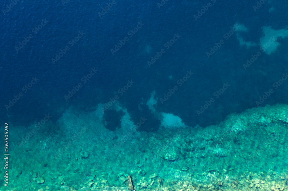 Obraz premium Abstract background of turquoise water-aerial view