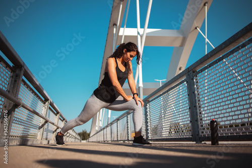 Young woman doing a stretching exercise 